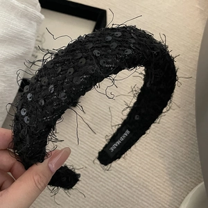 Elegant black sequin wool headband with feathers and handmade interior label