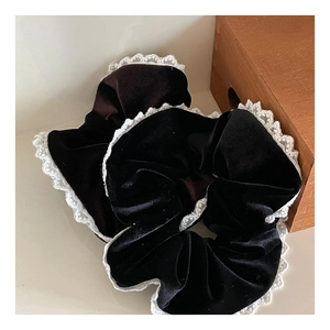 Elegant black velvet oversized scrunchies with white lace trim for sophisticated hair styling