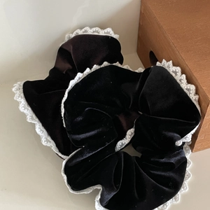 Set of black velvet scrunchies with white lace trim for ballet core hair styling