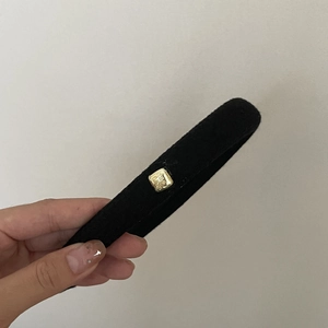 Elegant vintage black wool headband with high top and gold square metal buckle detail