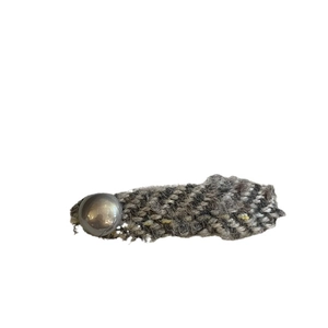 Elegant tweed fabric hair clip with a metallic bead in grey and brown for women
