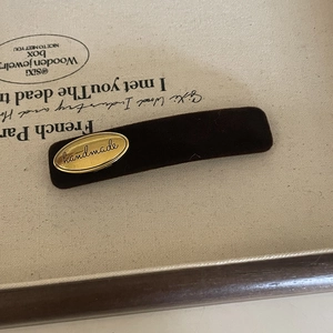 Vintage dark brown velvet hair clip with oval gold handmade metal plate detail