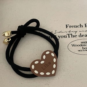Elastic hair tie with brown heart charm, Like lettering and gold metal tips