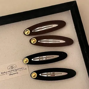 Französische Samt-Haarspangen im 4er-Set in Schwarz und Braun mit edlen Goldperlen-Details