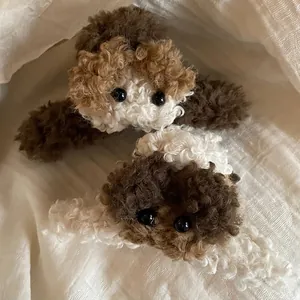 Cute plush puppy hair claw clips in brown and beige curly faux fur for women