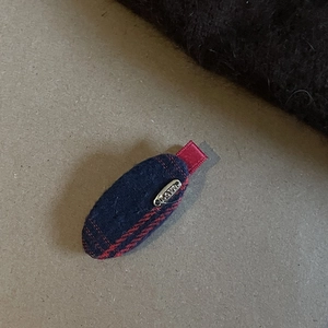 Navy blue and red plaid bow hair clip with engraved metal plate for women