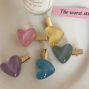 Set of 5 colorful heart-shaped hair clips in macaron colors with gold metal base