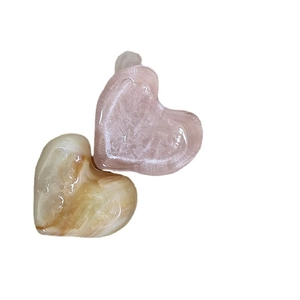 Pink and amber marble pattern heart hair clips with a polished resin finish for women
