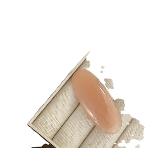 Elegant oval pink translucent gummy hair clip accessory for women in a display box