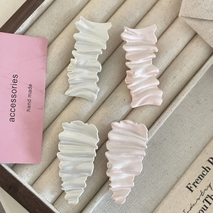Chic creamy white and pink pleated hair clips with iridescent mother-of-pearl finish