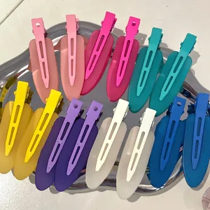 Matte leaf-shaped colorful seamless hair clips in a silver tray for women styling