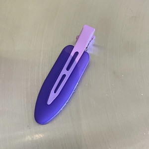Matte purple seamless hair clip with metal duckbill clamp for makeup and styling