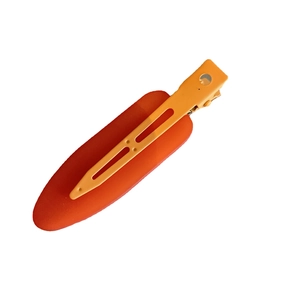 Matte orange non-marking hair clip with a sleek metal duckbill clamp for women