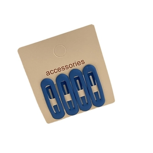 Set of 4 matte navy blue oval hollow hair clips for girls on display card