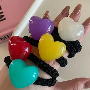 Five colorful jelly heart elastic hair ties for braided ponytail and bun hairstyles
