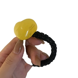Braided hair tie with translucent yellow heart charm and France Handmade engraving