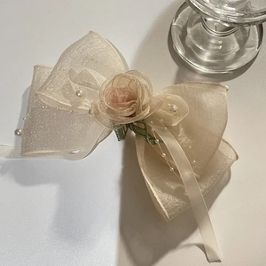 Elegant champagne organza bow hair clip with fabric rose flower and pearl accents