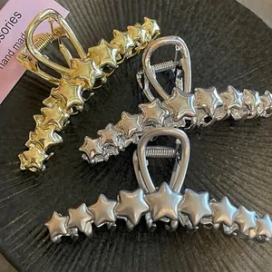 Set di 3 mollette per capelli Y2K in metallo a forma di stella in oro, argento e opaco