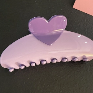 Purple heart claw clip made of acrylic with large shark grip for thick hair styling
