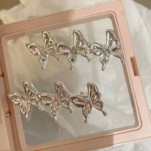 Ensemble de pinces à cheveux papillon argentées ornées de strass colorés étincelants