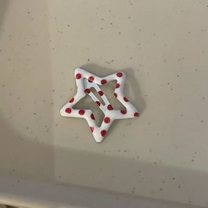 Y2K star hair clip with red polka dots on white enamel, cute accessory for girls