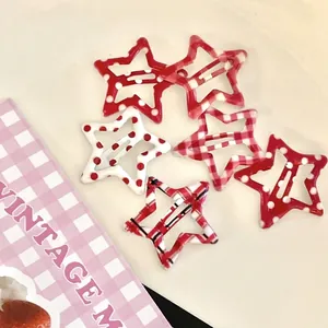 Set of 6 Y2K style star hair clips in red and white checkered and polka dot patterns