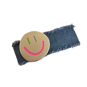 Blue denim BB hair clip with trendy pop art smiley face and distressed frayed edges