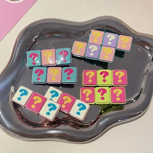 Cute colorful question mark hair clips on a stylish silver tray for women and girls