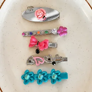 Set of five stylish heart and floral hair clips in various cute Y2K designs