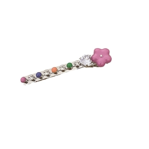 Sweet heart-shaped hair clip with colorful beads and floral accents on silver metal base