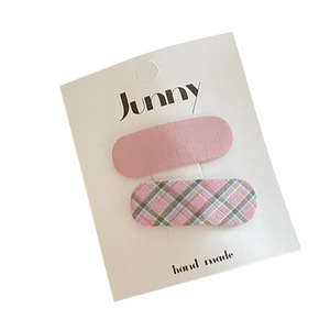 Handmade floral and matte pink BB hair clips set for girls and toddlers on a display card