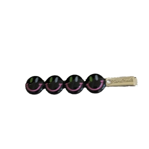 Pince à cheveux colorée smiley en métal avec quatre breloques noires brillantes pour femme
