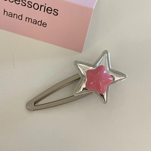 Y2K silver metal star hair clip with pink resin accent on a clean white background
