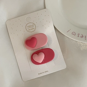 Lot de deux barrettes à cheveux rose en forme de cœur pour filles sur carte déco