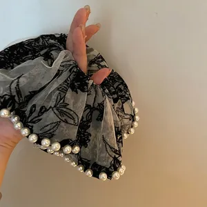 Elegant large white mesh scrunchie with black floral embroidery and pearl trim