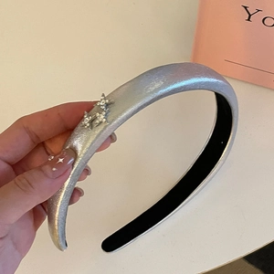 Silver glitter padded headband for women with sparkling rhinestone star decorations