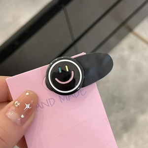 Cute black smiley face hair clip with handmade star pattern for women's side fringe