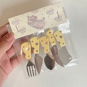 Five-piece stainless steel cutlery hair clips with yellow cheese-shaped handles