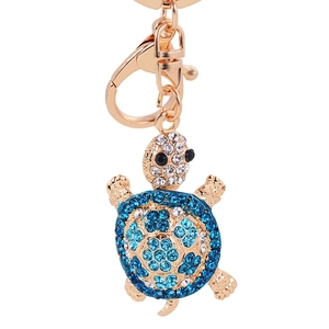 Portachiavi a forma di tartaruga con cristalli blu e finitura oro rosa per borse