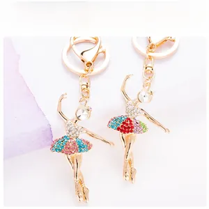 Détails du porte-clés de danseuse de ballet avec strass multicolores et placage d'or