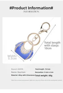Detail view of pearl handbag keychain with rhinestones and alloy spring clasp for cars