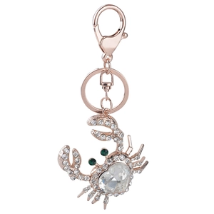 Rose gold crab keychain with heart-shaped crystal and sparkling rhinestone accents