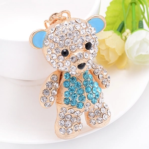 Sparkling crystal teddy bear keychain with blue rhinestones and gold plating