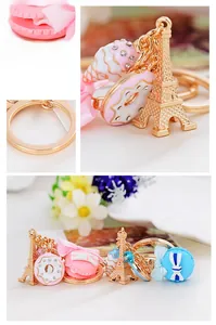 Detail view of macaron keychain with Eiffel Tower and rhinestone dessert charms