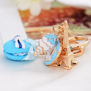 Sweet blue macaron keychain with ice cream donut and golden Eiffel Tower charm