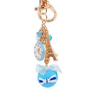 Sweet macaron and donut keychain with Eiffel Tower charm in blue and gold finish