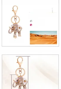 Détail montrant les dimensions de 11,5 cm du porte-clés éléphant en or rose et cristaux