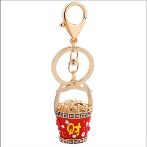 Golden prosperity bucket keychain with red rhinestones and lucky Chinese fortune character