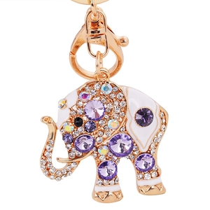 Porte-clés éléphant doré avec émail blanc, cristaux violets et strass scintillants