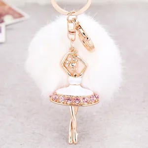 Ballerina keychain with white faux fur pompom and pink rhinestone embellished dancer charm